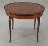 French round side table having blossoming flower inlaid top and pull out sides. ht. 24 in.; dia. 31 in.