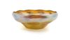 A Tiffany Studios Gold Favrile Glass Bowl, Diameter 10 inches.
