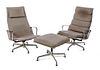 * Two Charles and Ray Eames Aluminum Armchairs, for Herman Miller, Height of tallest 38 1 /4 inches.