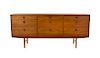 * A Folke Ohlsson Teak Chest of Drawers, for Dux, Height 31 1/2 x width 71 1/2 x depth 18 3/8 inches.