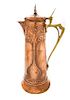 * A WMF Art Nouveau Brass and Copper Ewer, Height 17 1/4 inches.