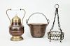 European Wrought-Iron Hanging Pot Holder, a Brass-Mounted Copper Pear-Form Jar and Cover, and a Copper Pan with Wrought-Iron Handles