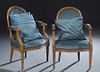 Pair of French Louis XVI Style Carved Polychromed Beech Fauteuils, 20th c., the oval cushioned back to upholstered scrolled arms, over a bowed seat on