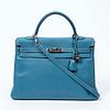 Hermes Kelly Retourne 35 Handbag, c. 2007, in blue clemence calf leather with silvered hardware, opening to a matching blue leather lined interior wit