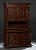 French Provincial Henri II Style Carved Oak Buffet a Deux Corps, c. 1880, the breakfront top over setback cupboard doors with relief carved hunting mo