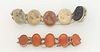 Two Vintage Link Bracelets, early 20th c., consisting of one with seven carved lava cameo links. together with one with seven nine graduated oval link