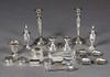 Nineteen Pieces of Miscellaneous Sterling, consisting of a salt and pepper; 2 low candlesticks; 4 shell form mint bowls, 2 matchbox holders, pair of t