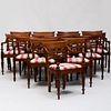 Group of Fourteen Anglo-Indian Carved Teak Armchairs