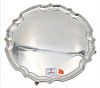 Silver Salver, on scrolled feet, diameter 12 inches, 23.2 t.oz. Provenance: Collections of Norma Reilly, New Jersey.