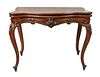Victorian Rosewood Gaming Table, top opening to reveal round felt interior, height 29 inches, top 19" x 35 1/2". Provenance: Estate of Florence Yannio