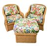Bielecky Brothers Three Piece Wicker Set, to include two armchairs and ottoman, along with custom cushions, height 32 inches, width 29 inches.