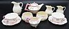 Six Piece Belleek Thornberry Pink Set, pink with black mark; along with five piece creamer and sugar set having black mark, tallest 4 1/2 inches. Prov