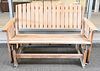 Teak Outdoor Glider Bench, height 34 inches, width 51 1/2 inches.