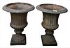 Pair of Victorian Iron Urns, height 19 inches, inside diameter 11 1/2 inches.