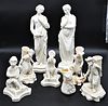 Figural Belleek Group, to include cherub, three figures with basket vases, along with two tall figures, height 12 inches. Provenance: Collections of N