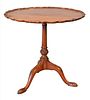 Margolis Mahogany Piecrust Table, on pedestal base, (slight sun fading), height 27 1/2 inches, diameter 28 inches.