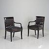 Pair Empire style black lacquered armchairs
