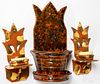 Three Lester Breininger redware wall sconces