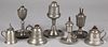Seven American pewter oil lamps, 19th c.