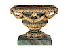 An Italian Louis XVI Style Parcel Gilt and Faux Marble Carved Wood Urn Height 15 x width 19 x depth 10 inches
