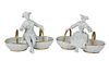 A Pair of Mottahedeh Blanc de Chine Figural Compotes Height 7 inches.