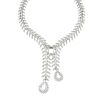 A 14ct gold rock crystal and diamond necklace. The brilliant and baguette-cut diamond articulated li