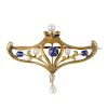 An early 20th century 14ct gold sapphire, diamond and seed pearl brooch. The circular-shape sapphire