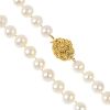 A cultured pearl single-strand necklace. Comprising thirty-four cultured pearls, measuring approxima