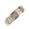 An 18ct gold diamond half-circle eternity ring. Designed as a series of baguette-cut diamonds, with