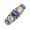 An early 20th century 18ct gold sapphire and diamond five-stone ring. The alternating circular-shape
