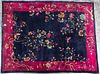 * A Chinese Wool Rug, 9 feet 5 inches x 7 feet 10 inches.