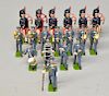 Britains band figures, (12), and Highland pipers, (6),