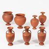 Seven Wedgwood Rosso Antico Vases