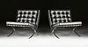 A PAIR OF BARCELONA CHAIRS IN BLACK LEATHER AND POLISHED STAINLESS STEEL, DESIGNER MIES VAN DER