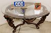 ANGEL SUPPORTED TRI POD BASE GLASS TOP COFFEE TABLE 20"H X 3' DIAM.