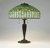 Tiffany Studios table lamp and leaded glass shade