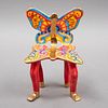 PEDRO FRIEDEBERG (Florencia, Italia, 1936 - ) Silla - mariposa. Escultura de céramica policromada y detallada con esmalte dora...