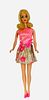 Blonde Marlo Flip TNT Barbie. Dressed in #3404 "Glowin' Out", hair and facial paint good, dress is bright, knee joints work well (three clicks).