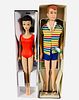 (2) Dolls including a reproduction Barbie and Vintage Allen. Barbie is a copy of a brunette and comes with her wrist tag, box, red swimsuit, metal sta