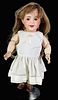 S.F.B.J. 236 bisque socket head character. 15" doll with human hair wig, glass sleep eyes with eyelashes, open/closed mouth with 2 molded upper teeth,