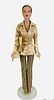 16" Tonner doll, redressed in gold blouse and gold and brown stripe pants, gold purse and shoes. No box.