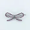 14kw Pink Spinel Bow Brooch