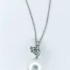 Sophisticated Cultured Pearl & Diamond Pendant Necklace