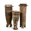 THREE TALL WEST AFRICAN CARVED WOOD DRUMS