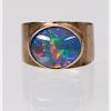 A 9kt. Yellow Gold and Opal Ring,