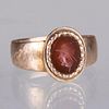 A 10kt. Rose Gold and Carved Agate Intaglio Ring.