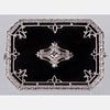 A 14kt. White Gold, Onyx and Diamond Brooch,