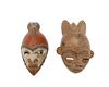Two African earthenware currency masks