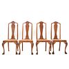 Lote de 4 sillas. SXX. Elaboradas en madera. Respaldos semiabiertos, asientos de palma tejida y asientos tipo garra.
