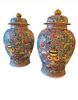 A pair of 19th century porcelain urns with lids, made by Samson EdmÃ© et Cie porcelain, of Paris Including NFT